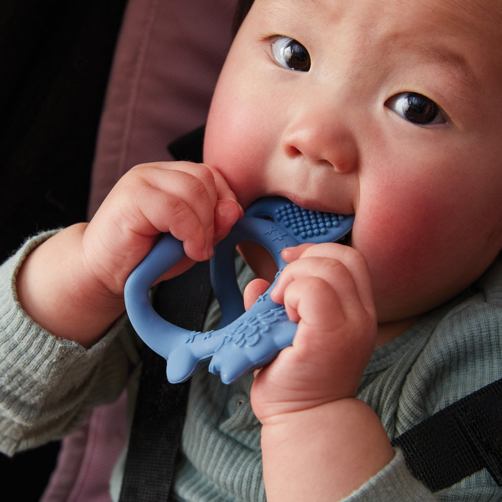 child with Wrist Teether - Sage - b.box for kids