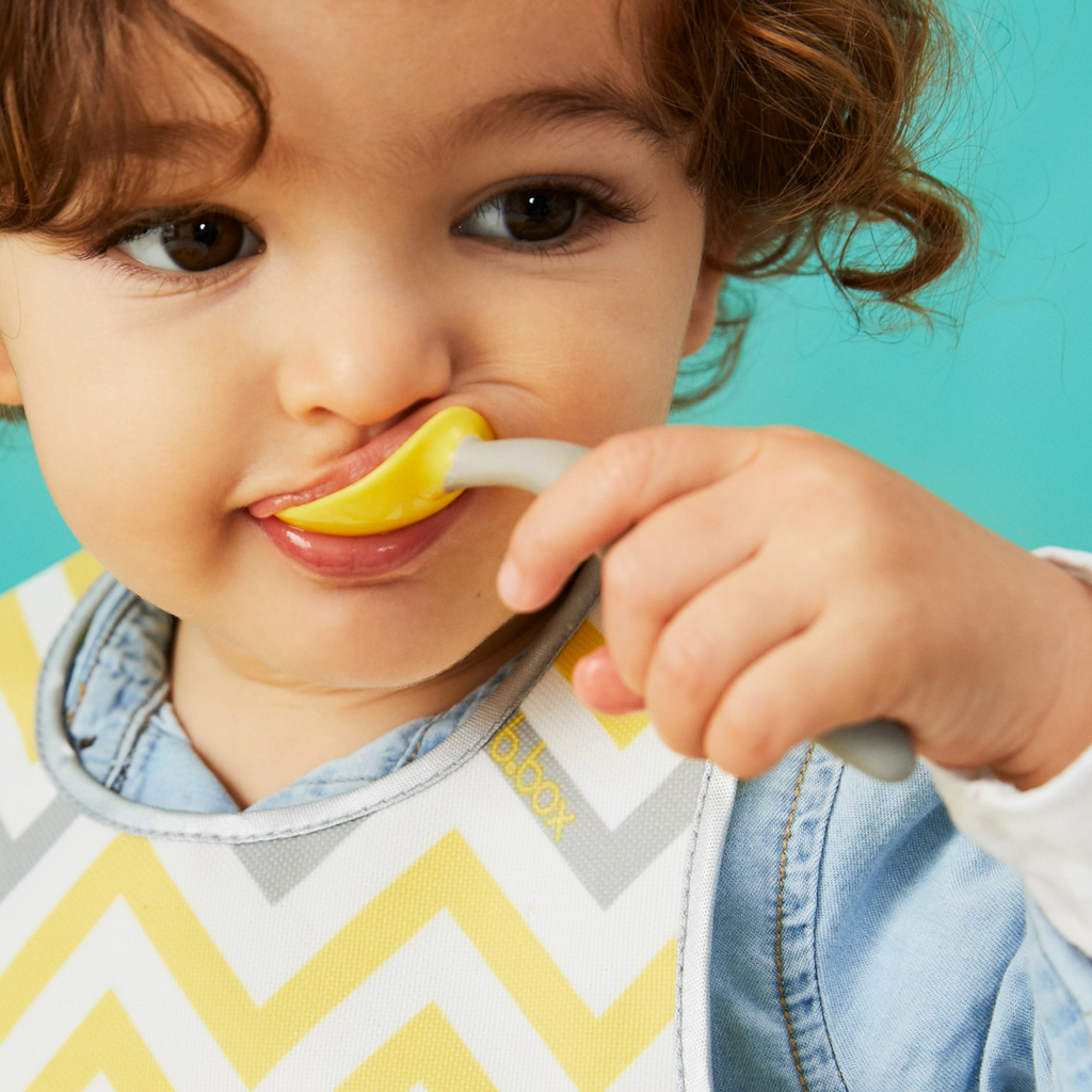 child with Toddler cutlery set - lemon sherbet - b.box for kids
