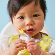 child with Toddler cutlery set - lemon sherbet - b.box for kids