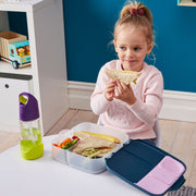 child with lunchbox - indigo rose - b.box for kids